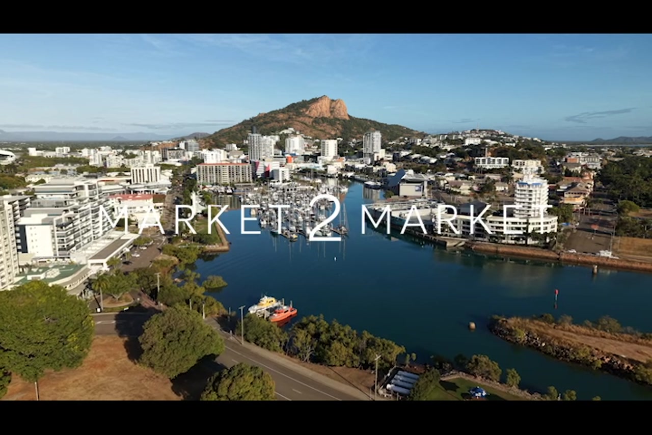 Aerial View of Townsville Marina with Castle Hill in the Background
