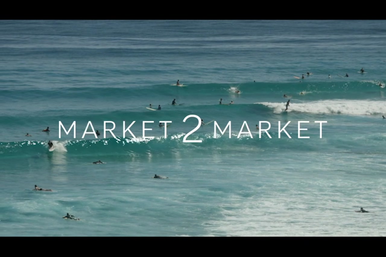 Surfers Catching Waves – Gold Coast