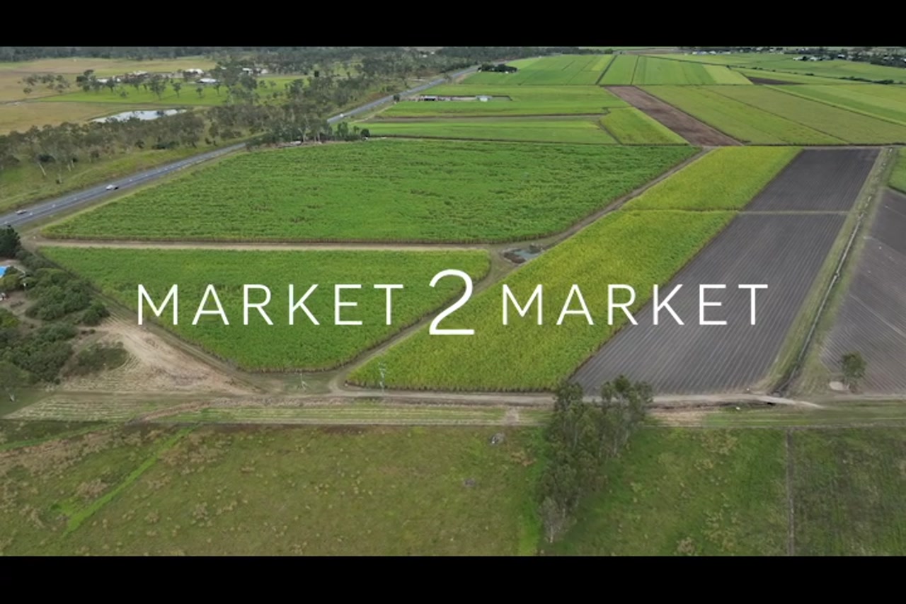 Aerial footage over rural, agricultural field in Mackay