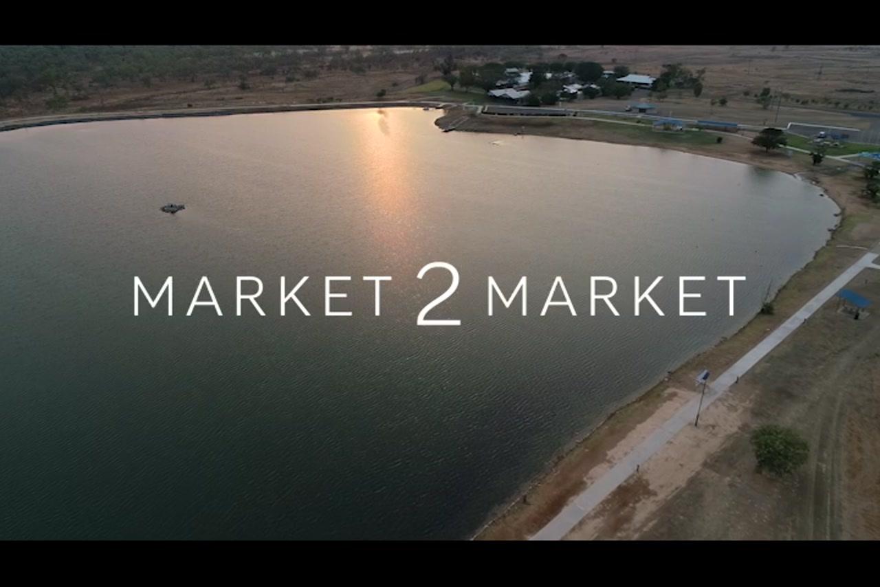 Aerial footage over rural property with a dam, North Queenslands