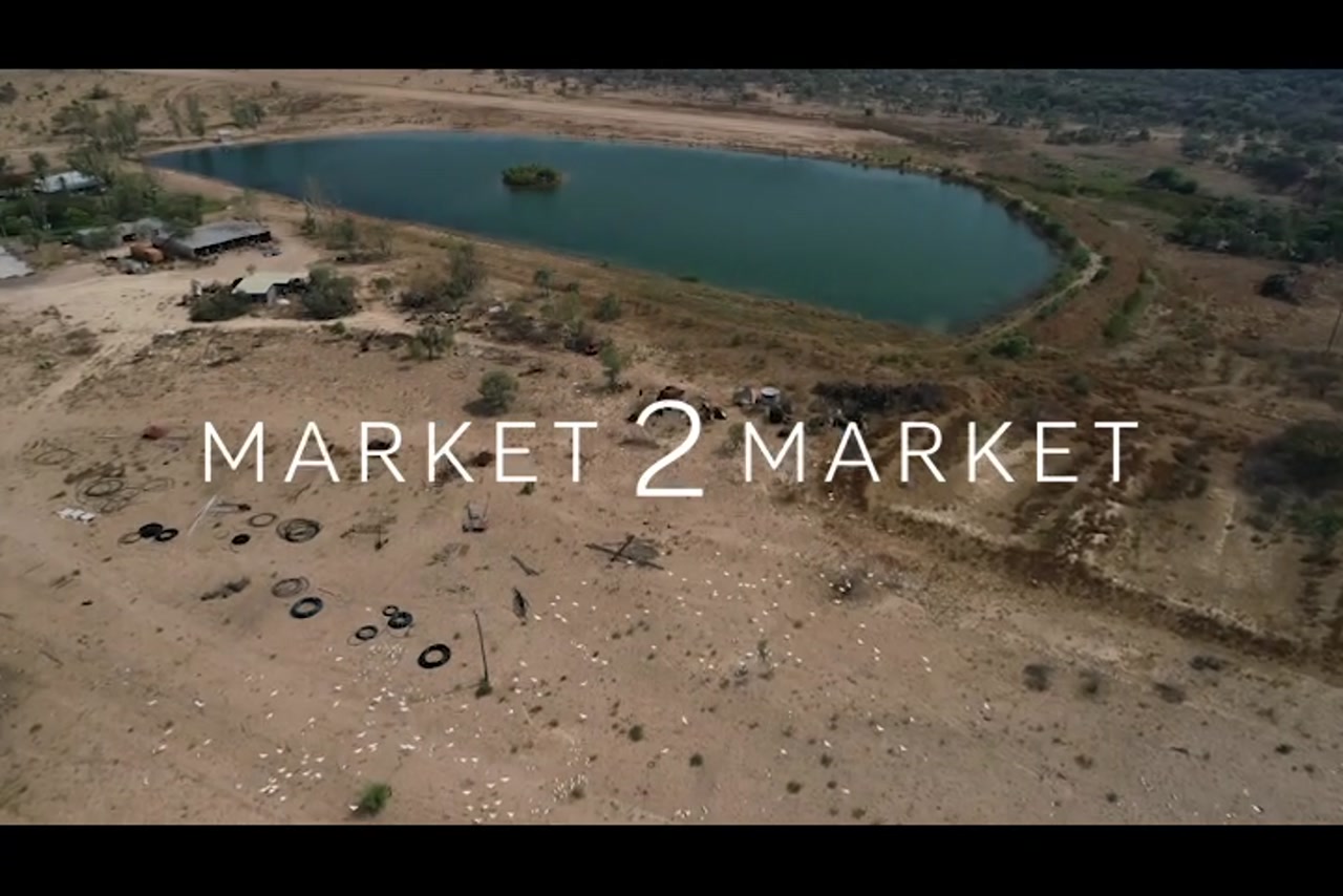 Aerial footage over rural property with a dam, North Queenslands
