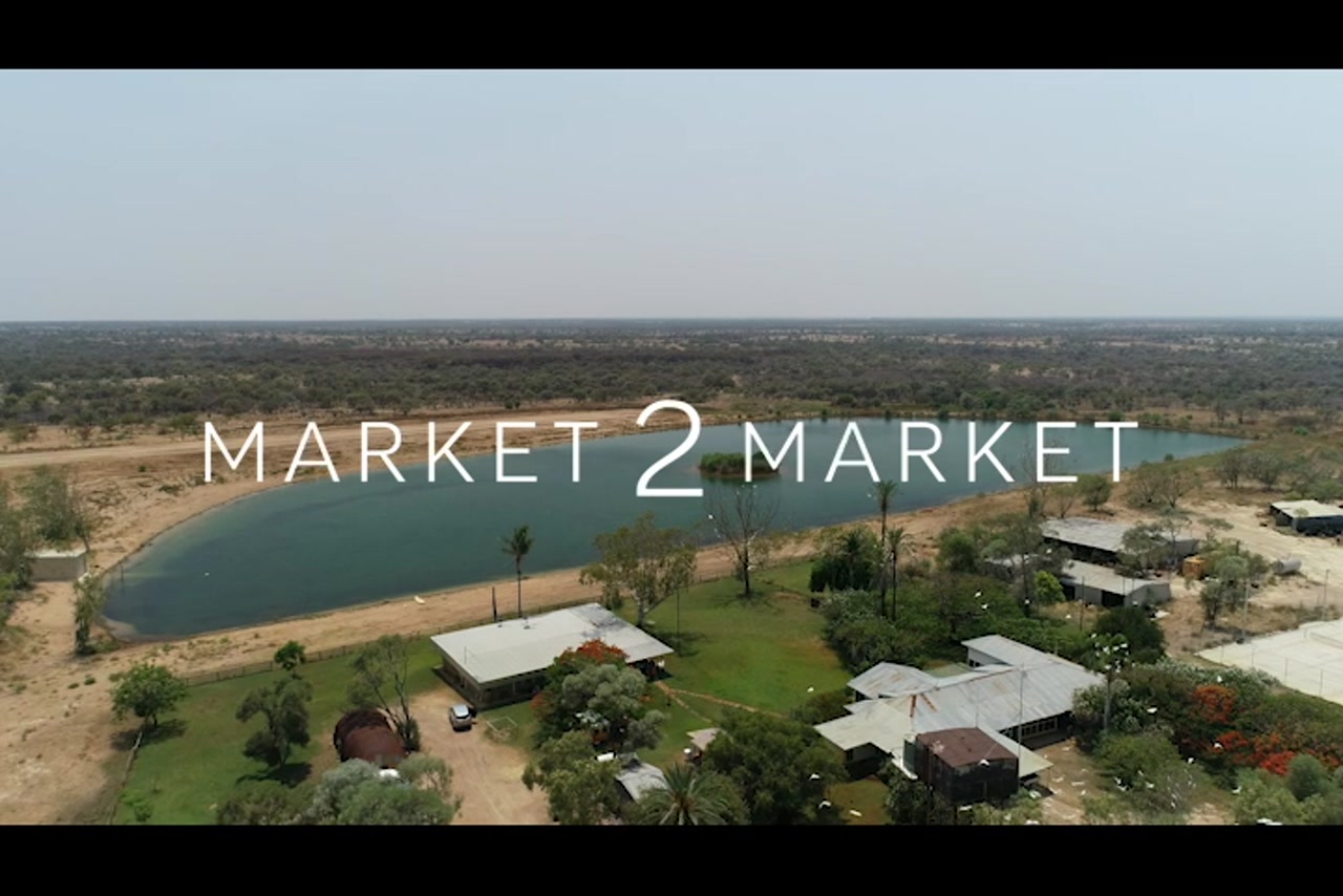 Aerial footage over rural property with a dam, North Queenslands