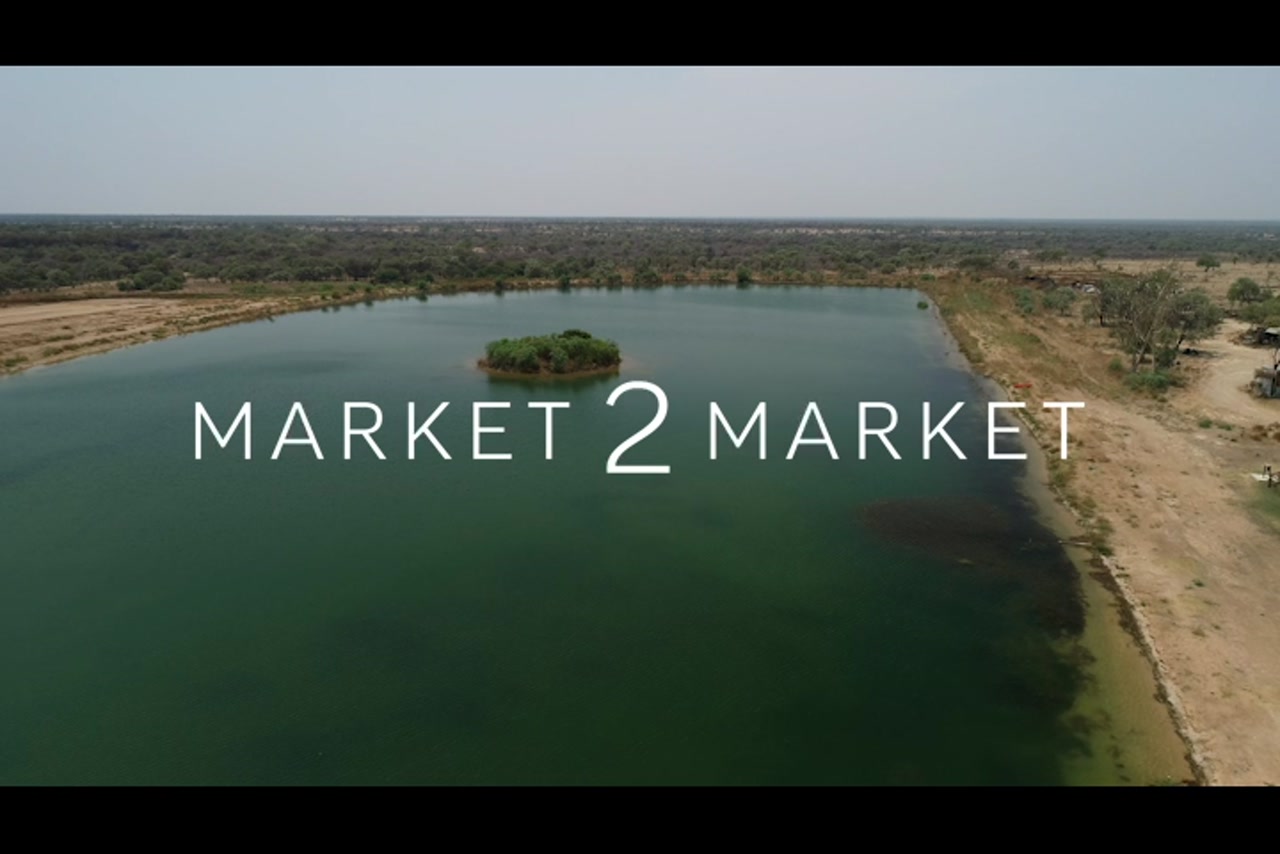 Aerial footage over rural property with a dam, North Queenslands