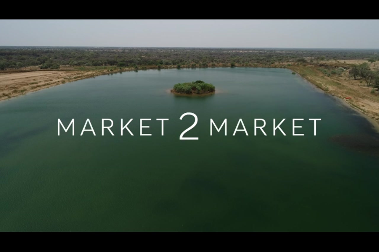 Aerial footage over rural property with a dam, North Queenslands