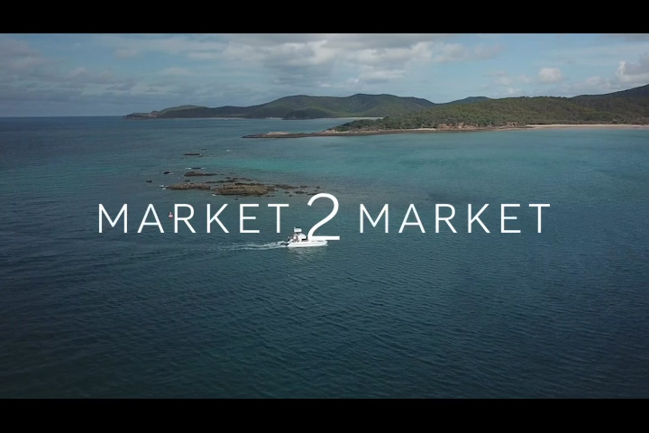 Aerial footage of yacht sailing off Great Keppel Island