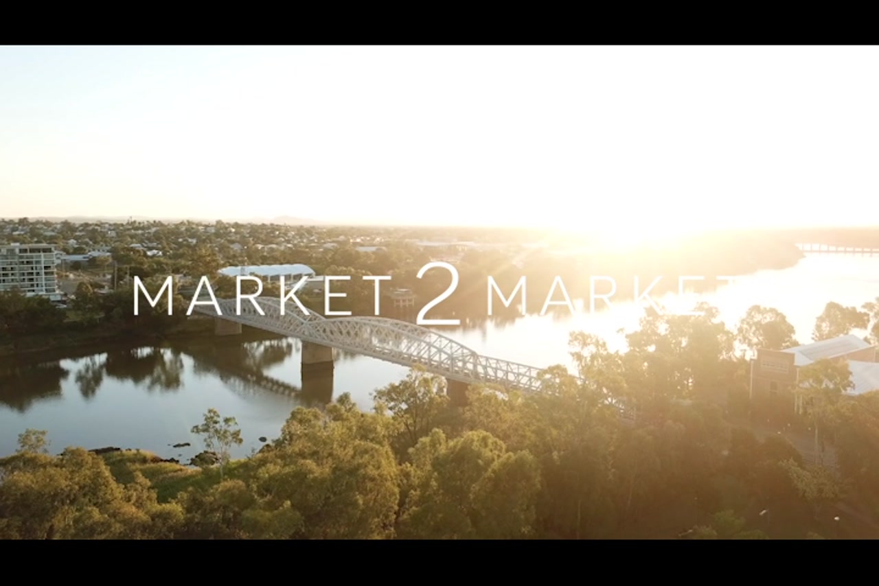 Aerial footage of Alexandra Bridge and Fitzroy River at dusk, Rockhampton