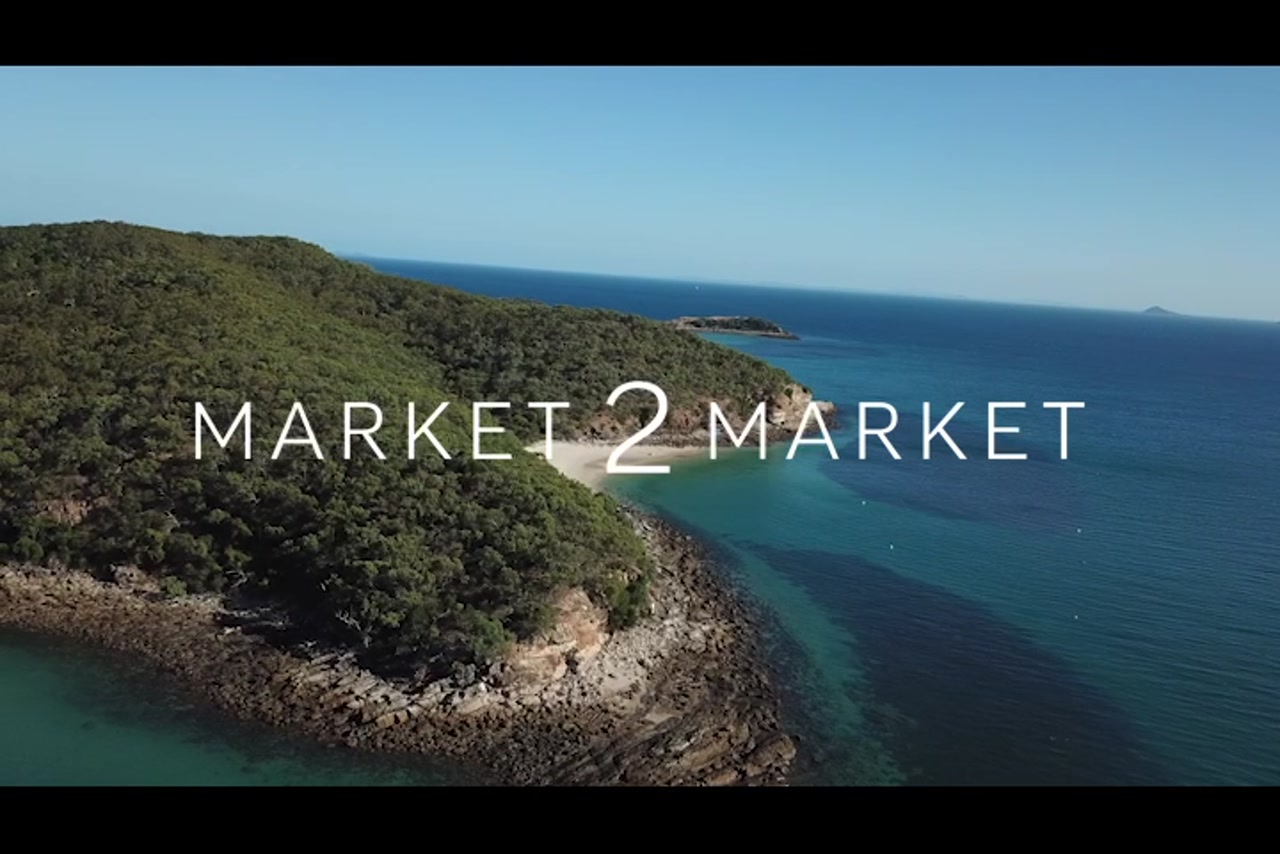 Aerial footage over coastline of Great Keppel Island