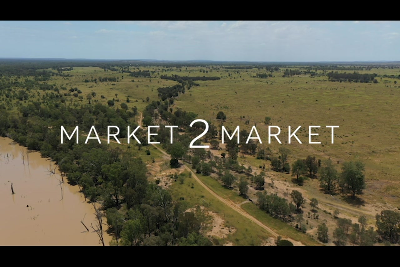 Aerial footage over open pastoral paddocks