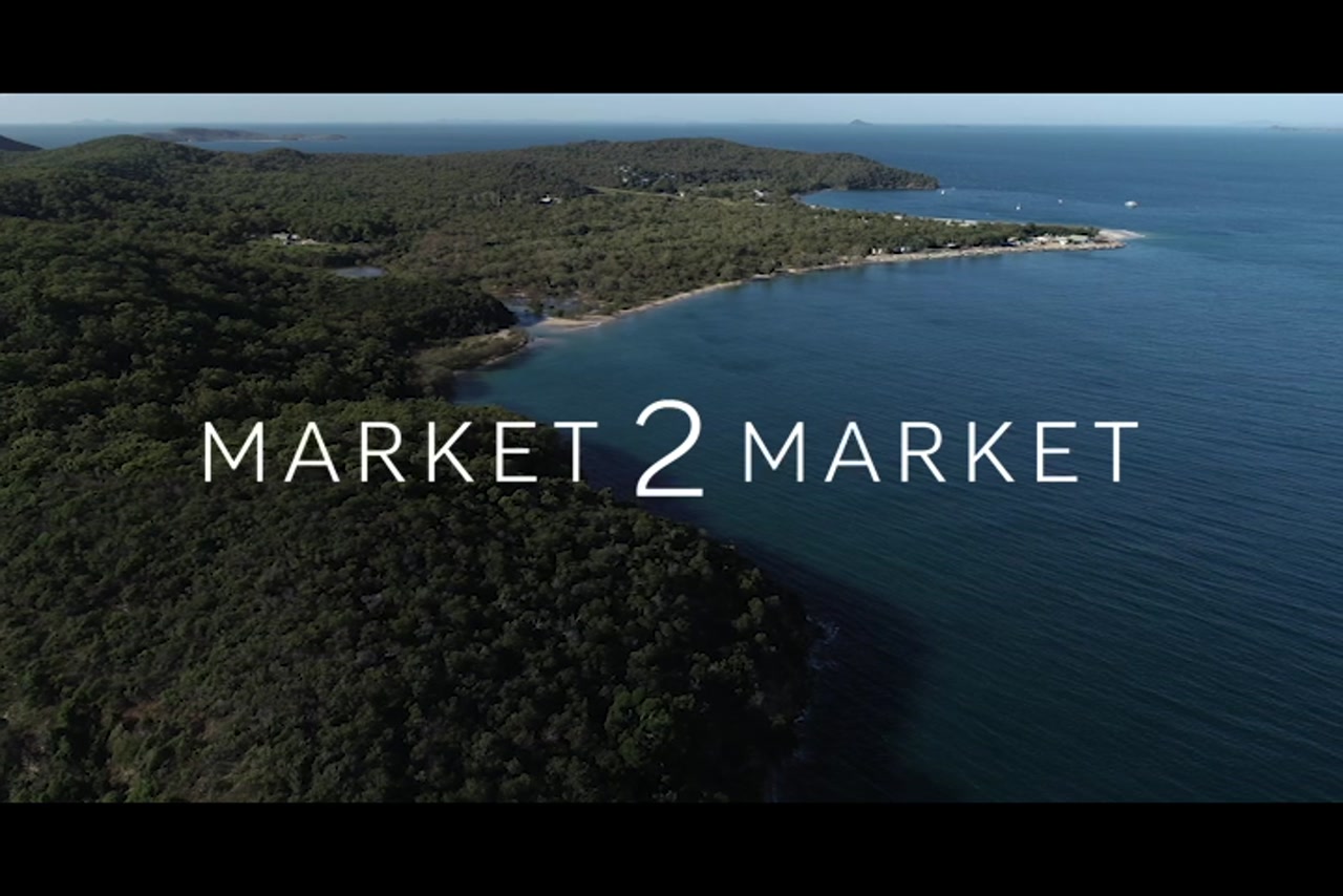 Aerial footage over beaches and coastline of Great Keppel Island