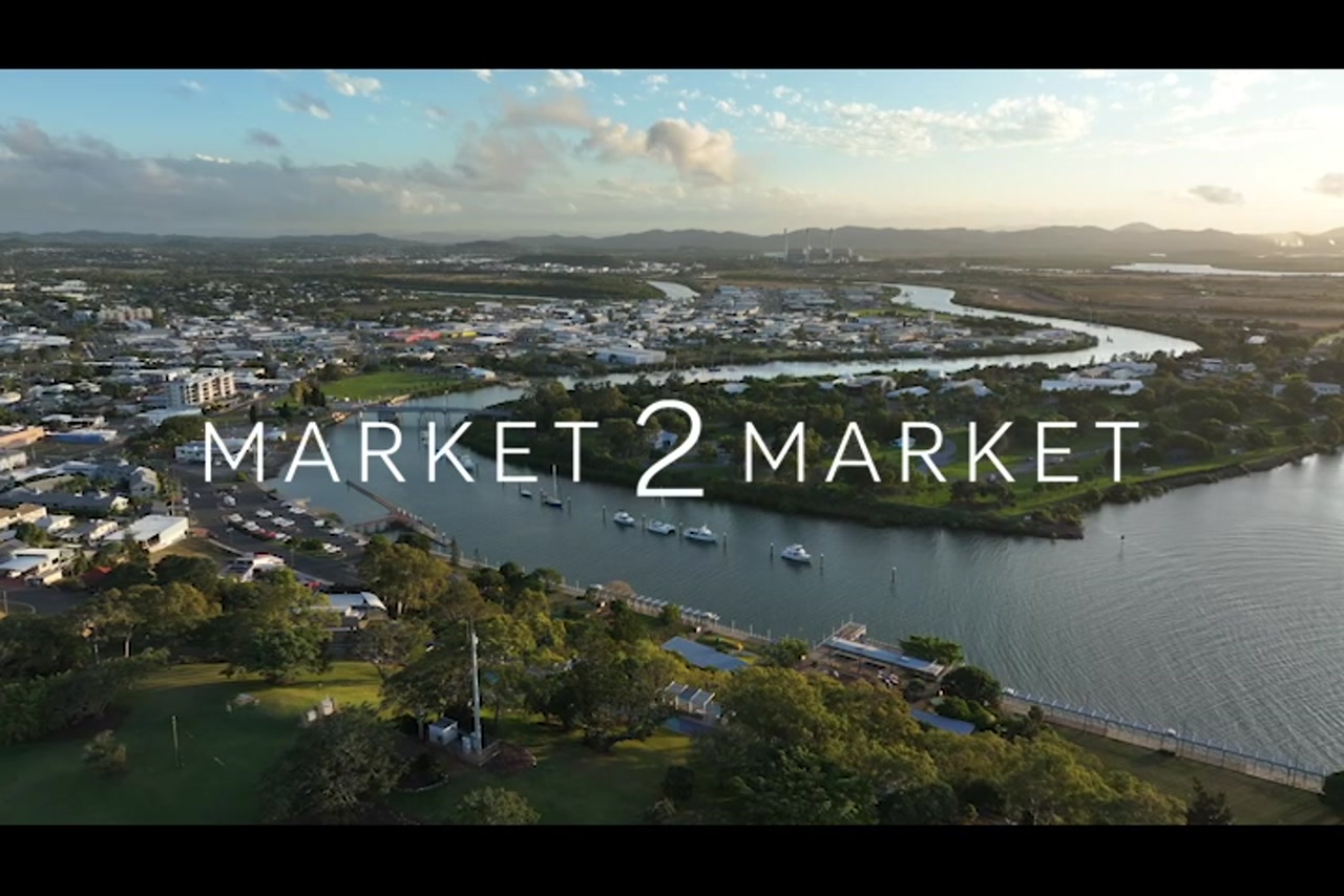 Aerial footage over East Shore at dusk, Gladstone