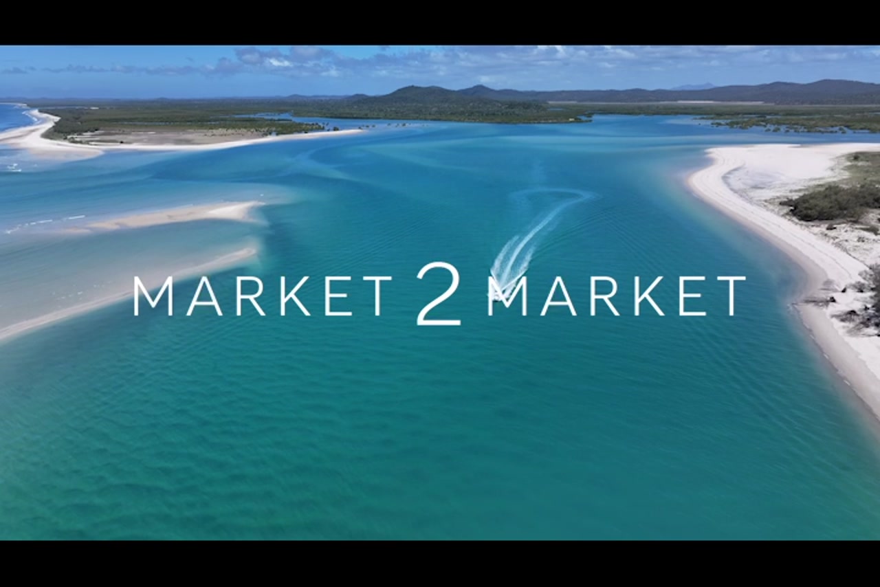 Aerial footage of speedboat off the coast of Curtis Island