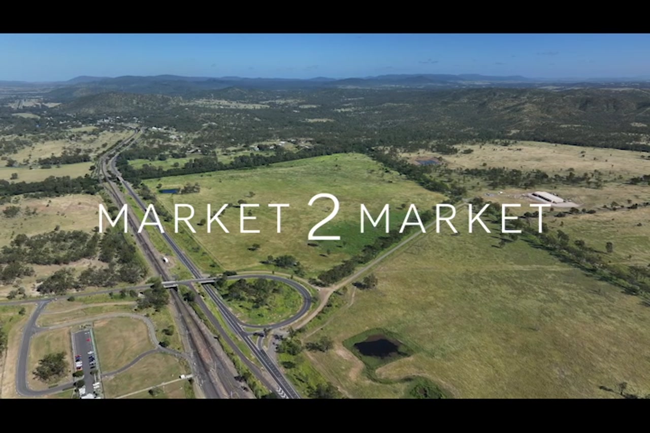 Aerial footage over highway in regional area of Central Queensland