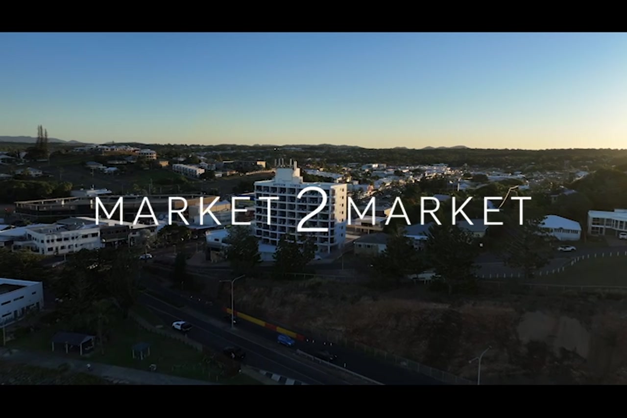 Aerial footage over Seaview Towers at dusk in Yeppoon